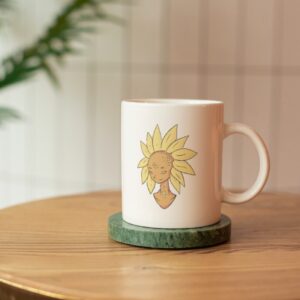 white mug with delicate illustration of a moon rock and sun flower personified.